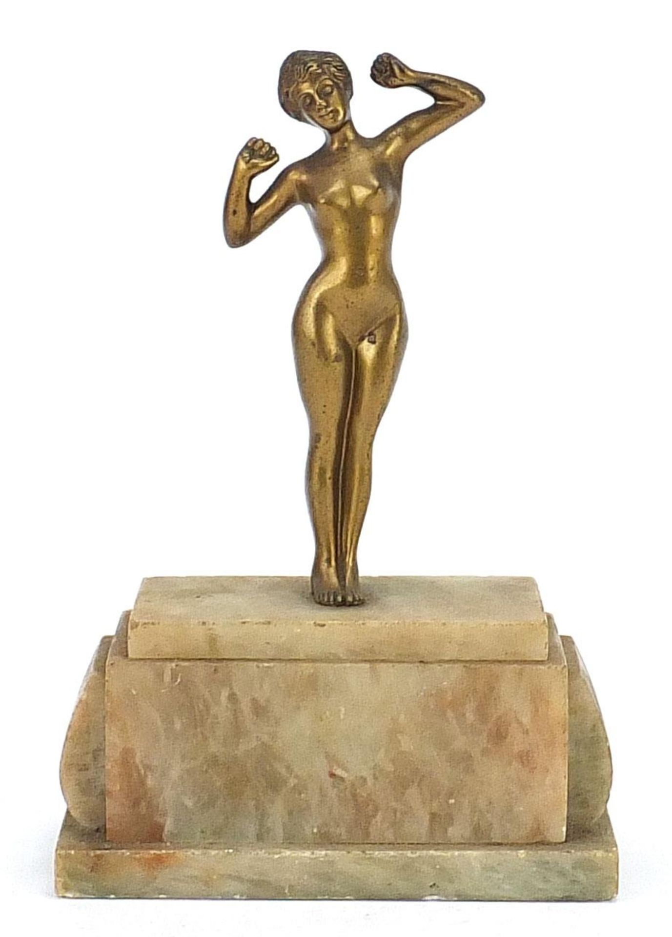 Art Deco nude figurine of a young lady standing on an alabaster base, 22cm high
