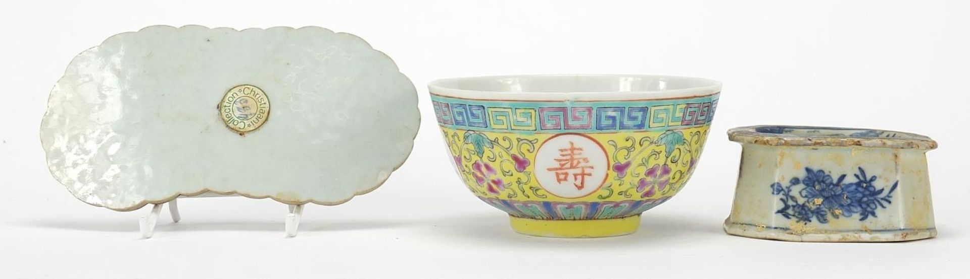 Chinese porcelain comprising a Canton wrist rest, blue and white salt and a famille rose bowl, the - Image 5 of 10
