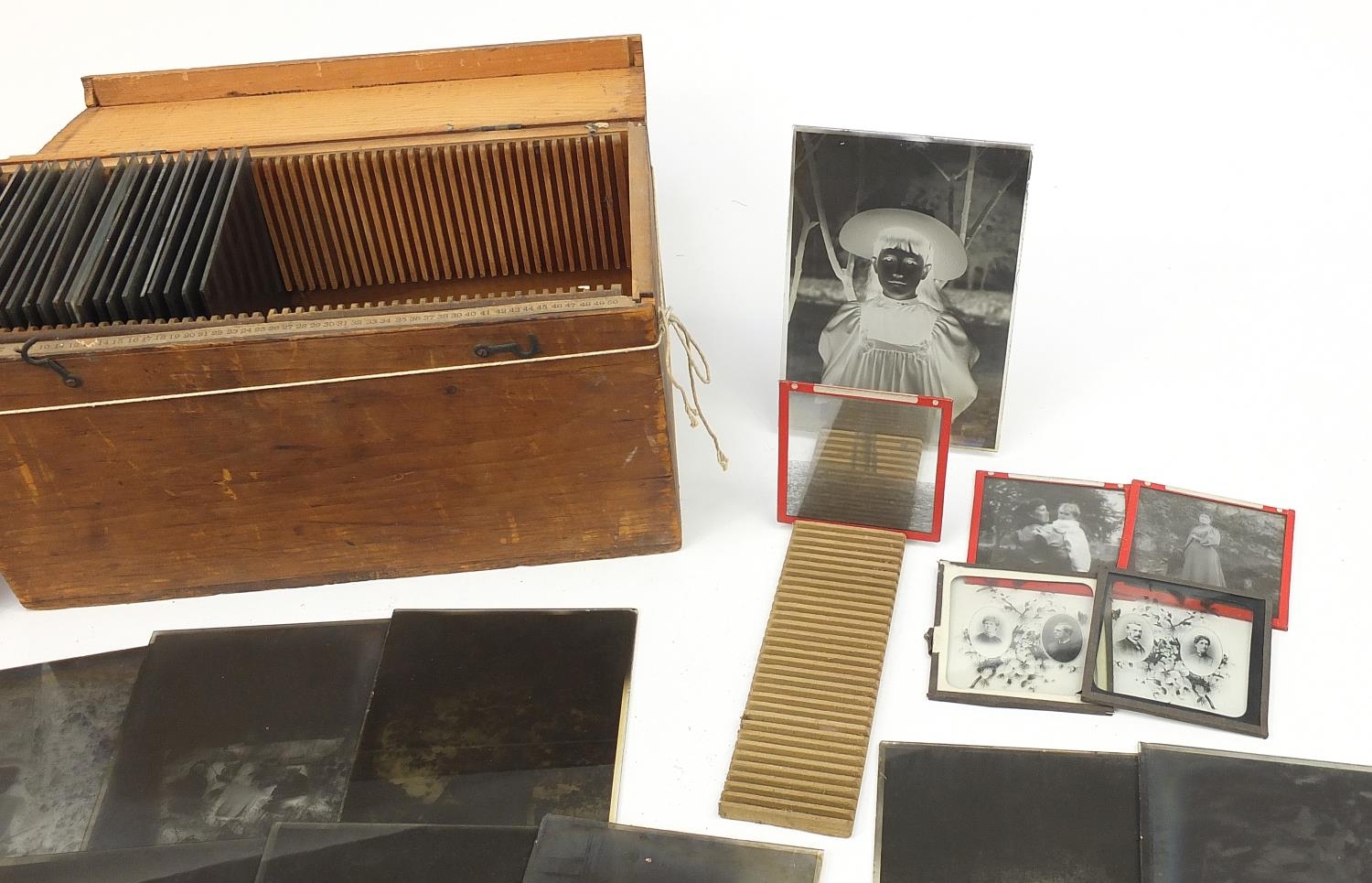 Collection of 19th century social history black and white glass slides arranged in two cases - Image 3 of 12