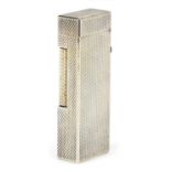 Dunhill, silver plated pocket lighter with engine turned decoration, 6.2cm high