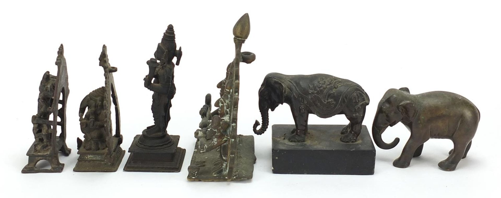 Indian bronzes including votive figures and two elephants, one raised on a rectangular black slate - Image 5 of 9