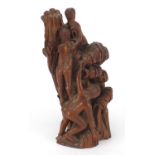 Antique treen carving of figures climbing a tree, 19.5cm high