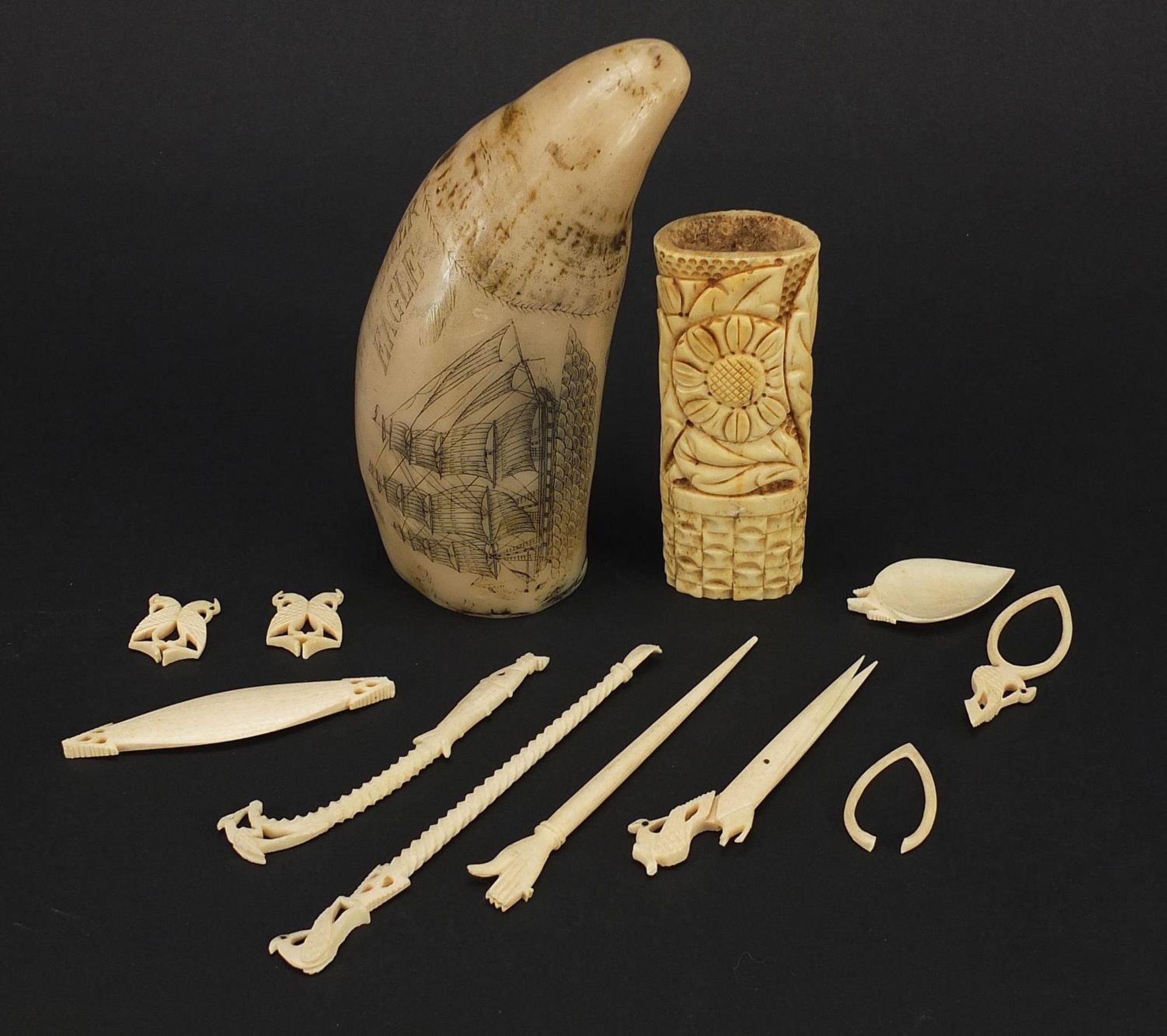 Ivory and bone objects including scrimshaw, the largest 13cm in length - Image 4 of 4