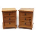 Pair of Mexican pine three drawer bedside chests with iron handles, 68cm H x 52cm W x 49cm D