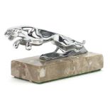 Chrome Jaguar car mascot on a grey marble plinth, 13cm in length