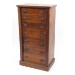 Oak seven drawer Wellington chest, 112cm H x 60cm W x 37cm D