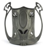 WMF, German Art Nouveau pewter bottle stand with twin handles numbered 47 to the base, 21cm high