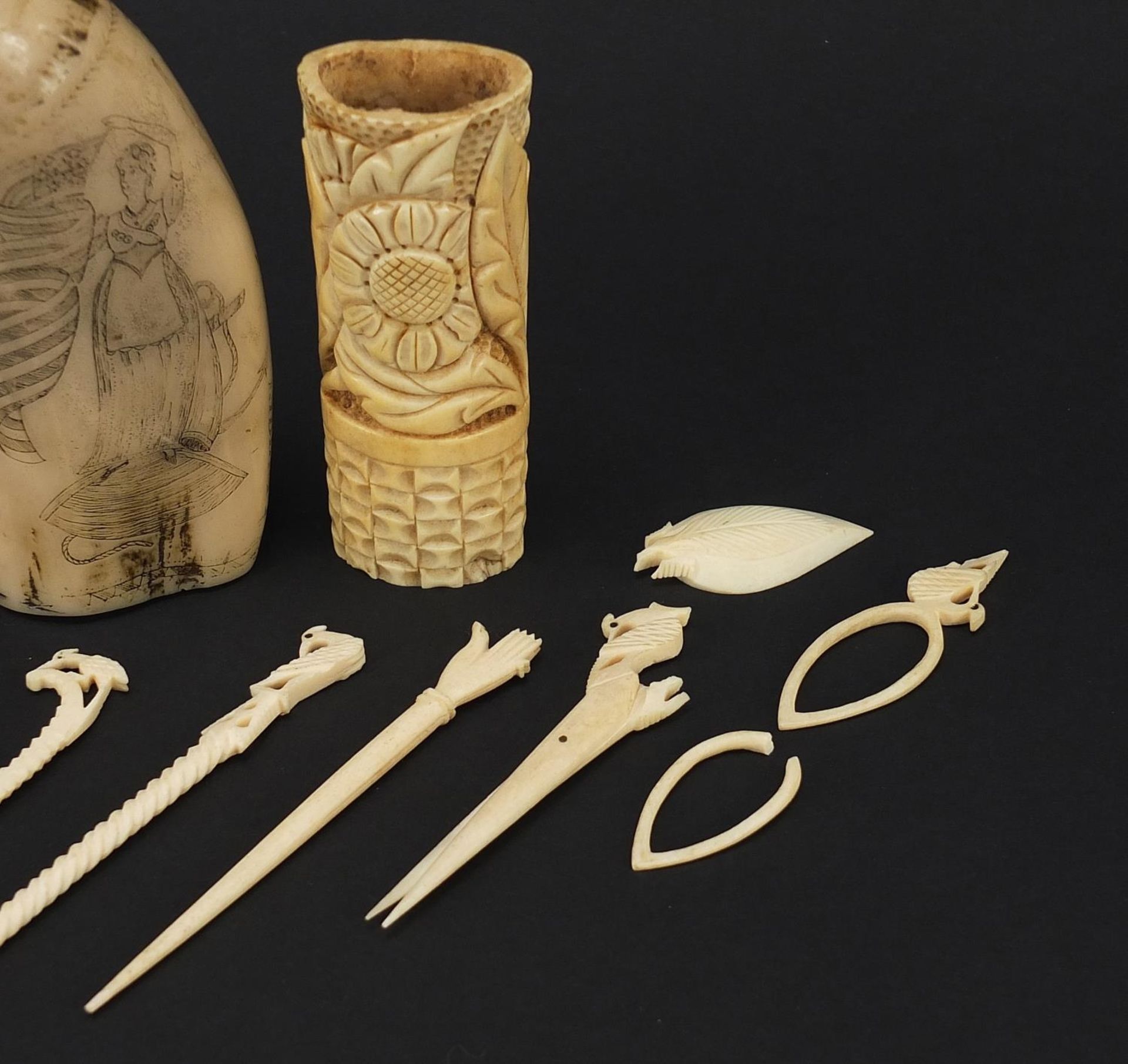 Ivory and bone objects including scrimshaw, the largest 13cm in length - Image 3 of 4