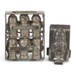 Two continental cast metal chocolate moulds of children including one stamped Wein, the largest 16.