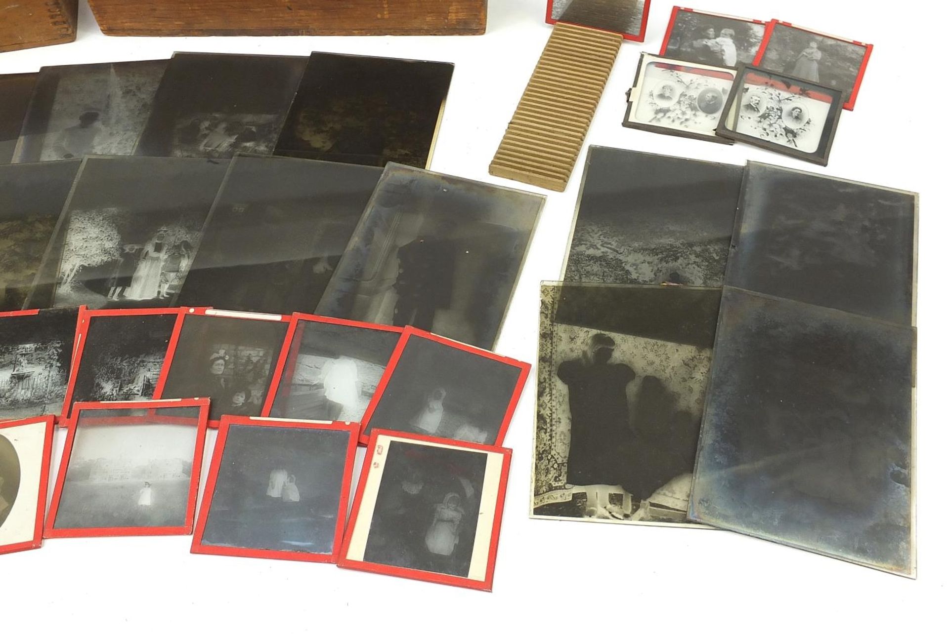 Collection of 19th century social history black and white glass slides arranged in two cases - Image 5 of 12