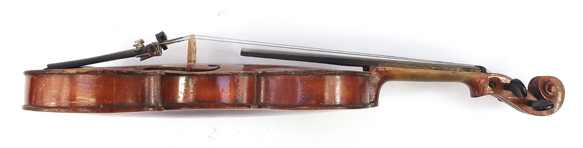 Old wooden violin with two bows and protective case, the violin back 14 inches in length, one violin - Image 4 of 11