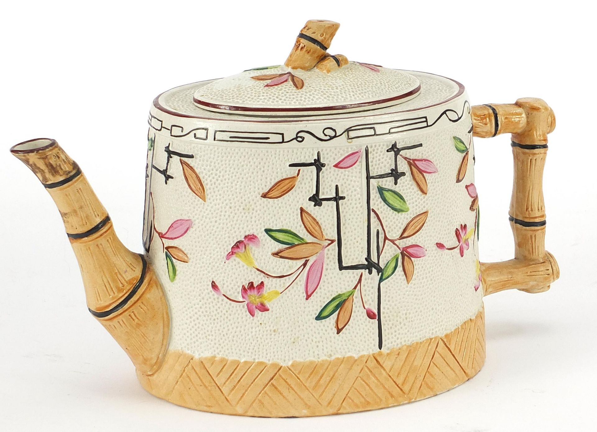 Christopher Dresser style aesthetic teapot, registration number to the base, the side decorated with