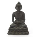 Chino Tibetan patinated bronze figure of seated Buddha, 10.5cm high