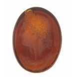 Hardstone intaglio seal, carved with a classical bust and indistinct inscription, 3cm high, 5.2g
