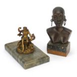 Bronze African nude female bust on marble stand and a gilt bronze figure of Neptune astride two