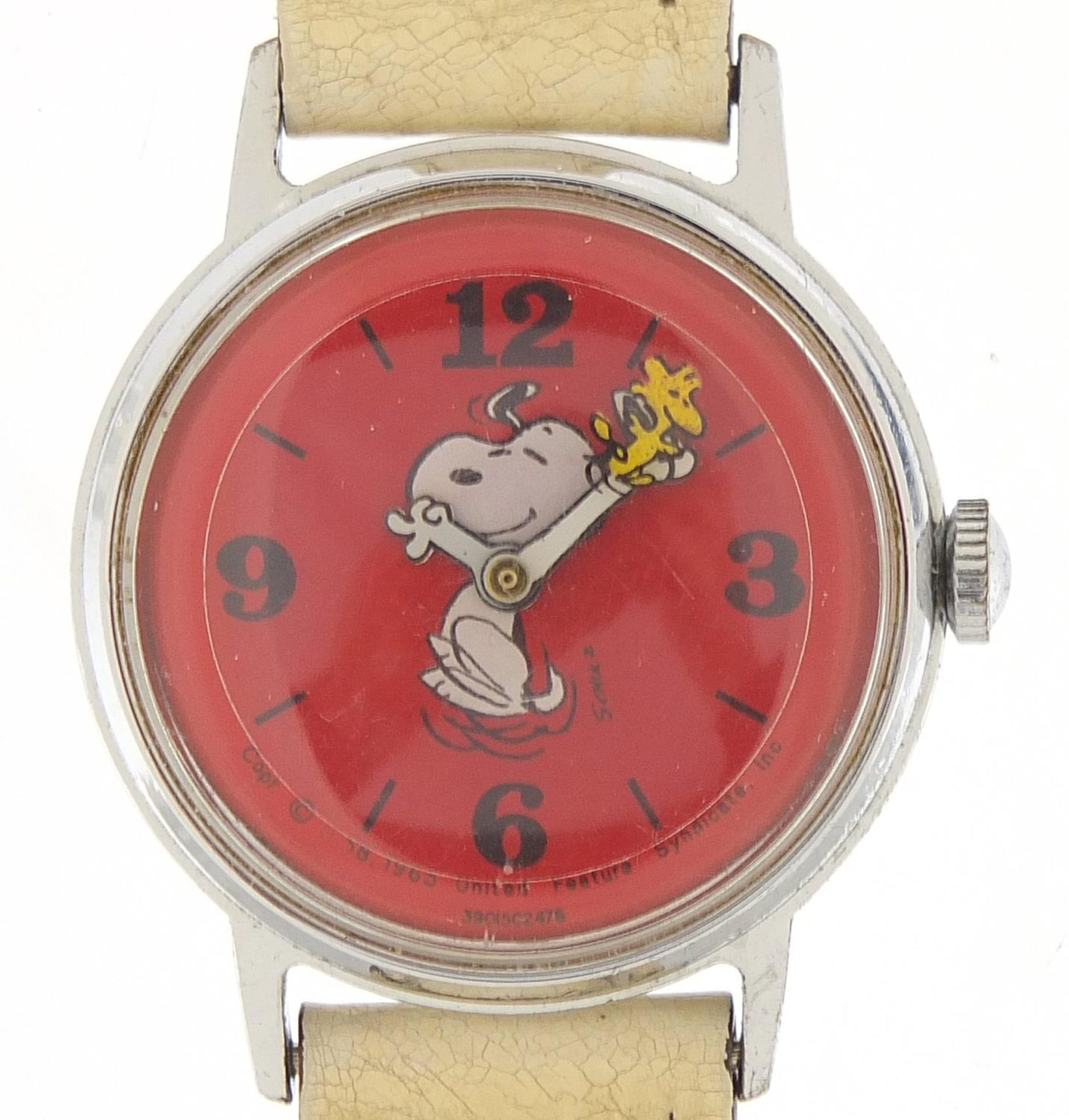 Vintage Snoopy wristwatch with moving arms, 31mm in diameter
