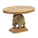 Carved beech elephant occasional table, 48cm H x 71cm W x 58cm D