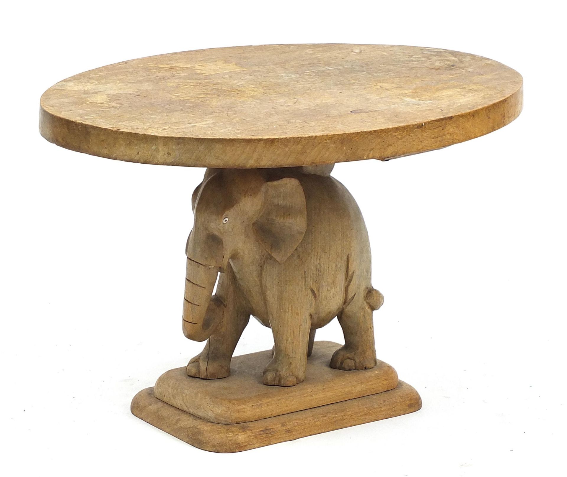 Carved beech elephant occasional table, 48cm H x 71cm W x 58cm D