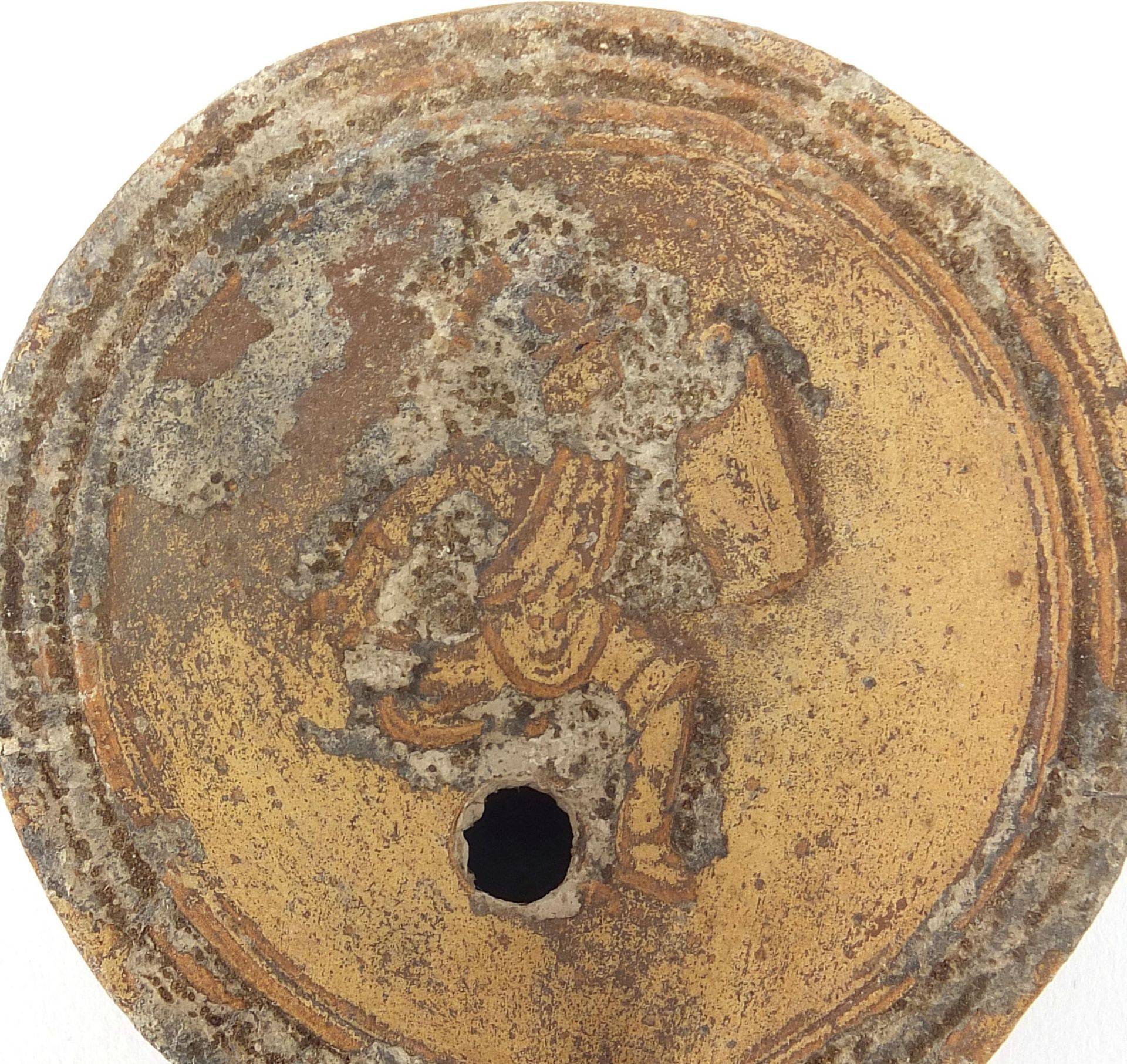 Roman terracotta oil lamp decorated in relief with a figure, 9cm in length - Image 4 of 5