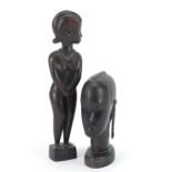 Two African hardwood figures, one of a standing nude lady, the other of a ladies head, the largest