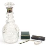 Cut glass decanter with silver collar, silver and mother of pearl folding knife and a silver locket,