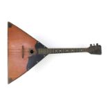 Russian balalaika decorated with temples, 66cm in length