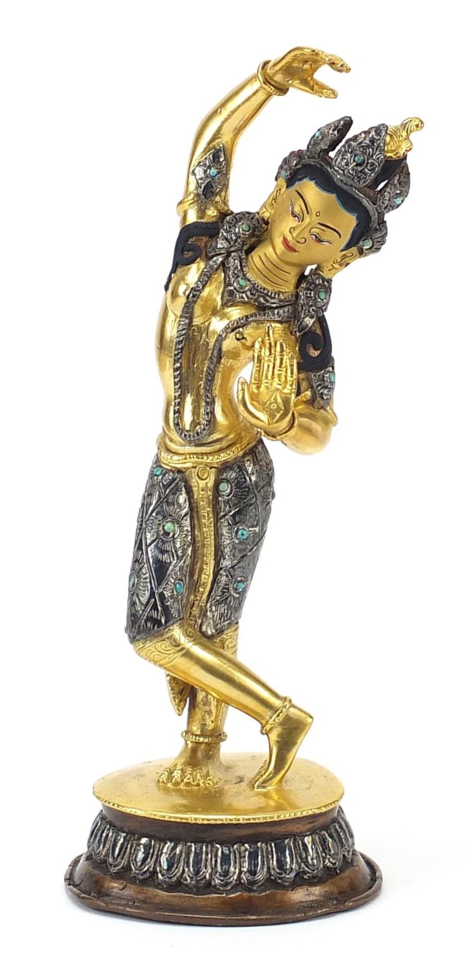 Chino Tibetan gilt bronze figure of dancing deity, 20cm high