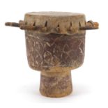 Tribal interest drum carved with geometric motifs, 29cm high