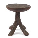 African tribal interest carved stool, 34cm high x 31cm in diameter