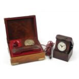 Dial telephone housed in a brass bound wooden box together with a travelling style clock housed in