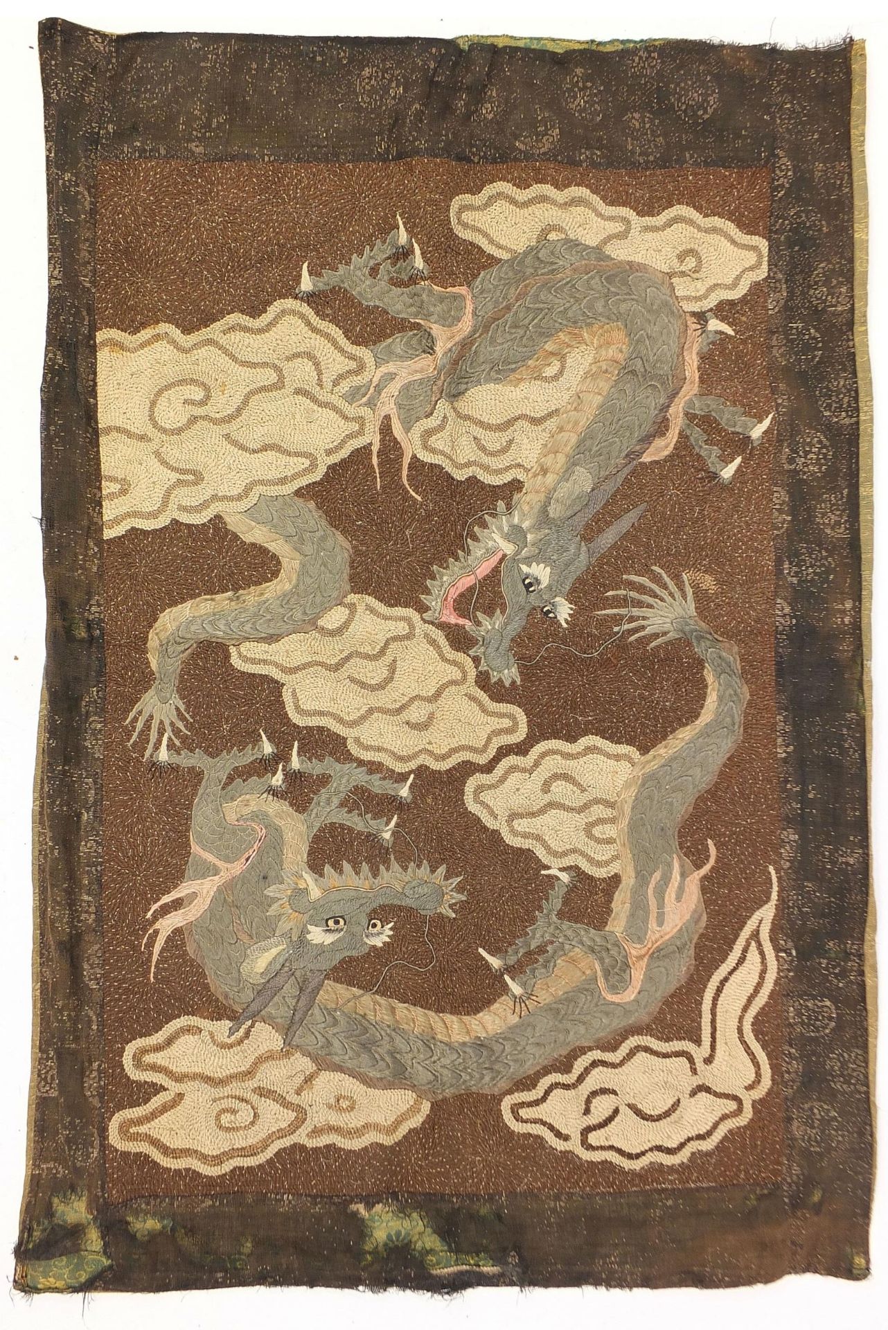 Chinese embroidered wall hanging depicting two three toed dragons amongst clouds, 102cm x 70cm
