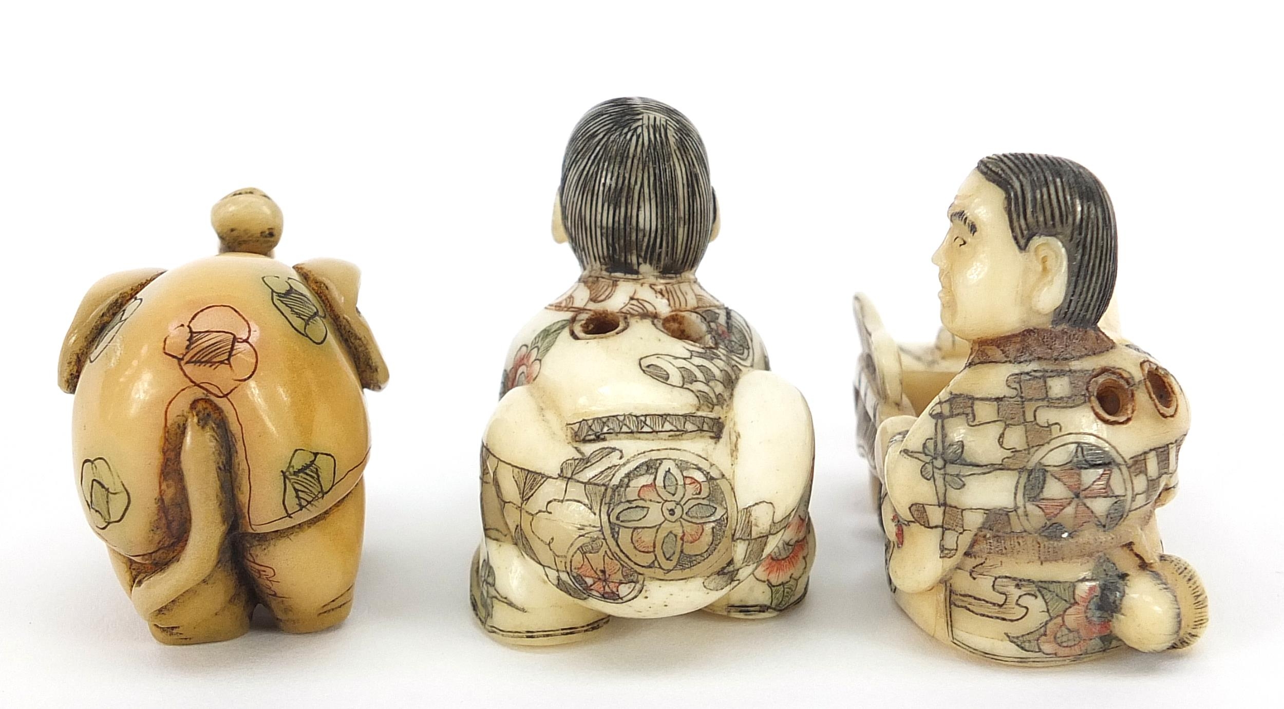 Three Japanese carved ivory netsukes including a elephant, character marks to the bases, the largest - Image 4 of 8