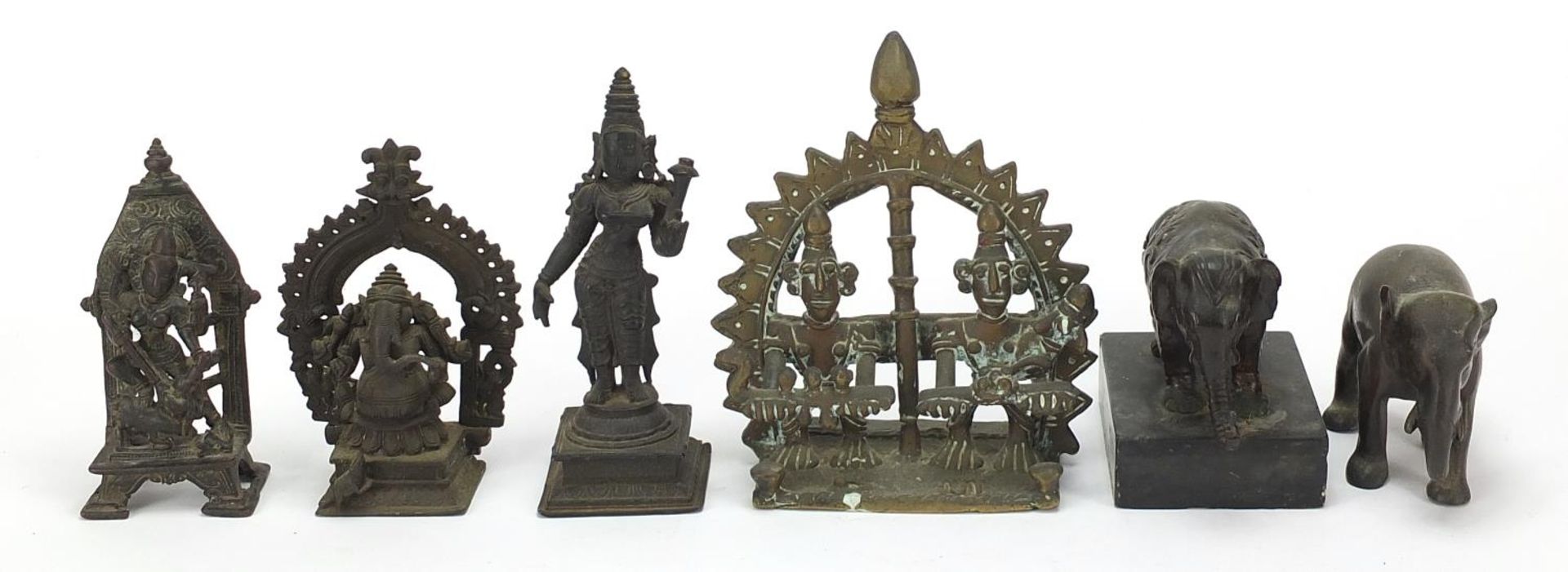 Indian bronzes including votive figures and two elephants, one raised on a rectangular black slate - Image 4 of 9