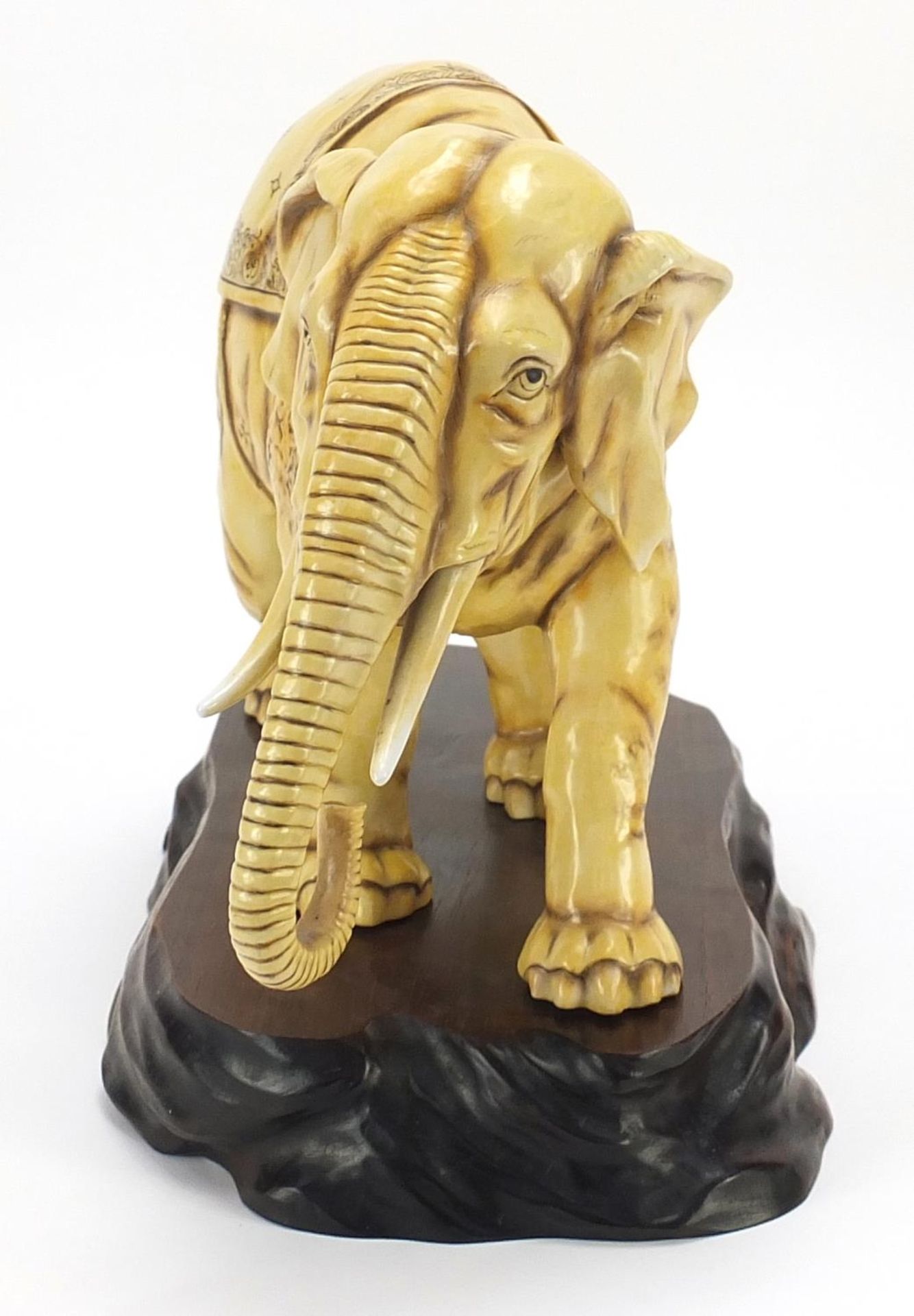 Ivory coloured porcelain model of an elephant on wooden stand, blue anchor mark under one foot, - Image 2 of 11
