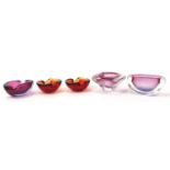 Five Murano red and pink glass dishes, the largest 20cm in diameter