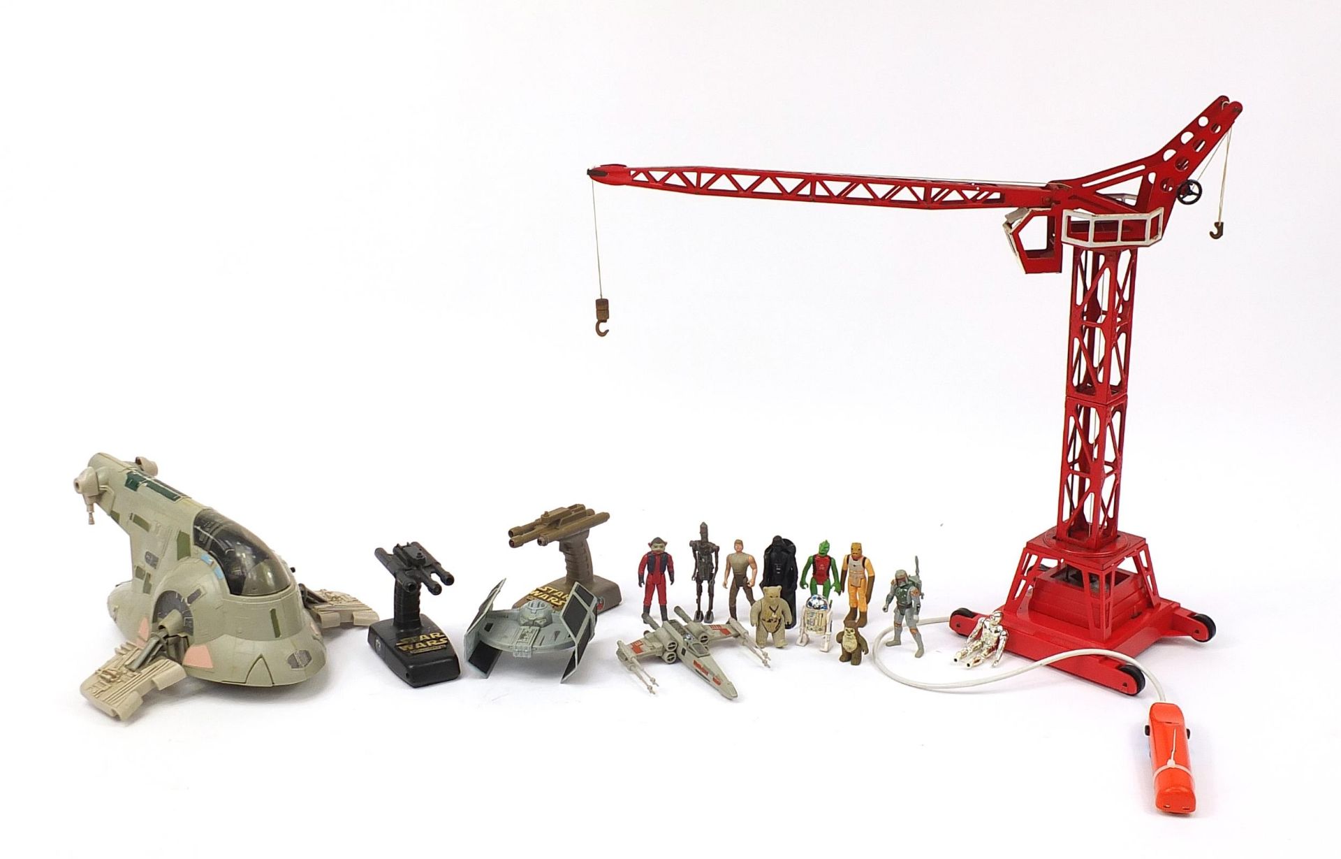 Vintage Star Wars figures and vehicles and a red Meccano design metal crane, the crane 60cm high