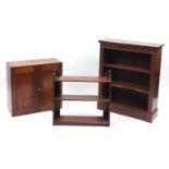 Mahogany occasional furniture comprising open bookcase, two door cupboard and wall hanging