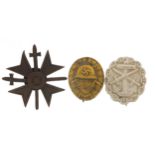 Three German military interest badges