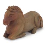 Chinese hardstone carving of a recumbent horse, possibly jade, 15.5cm in length