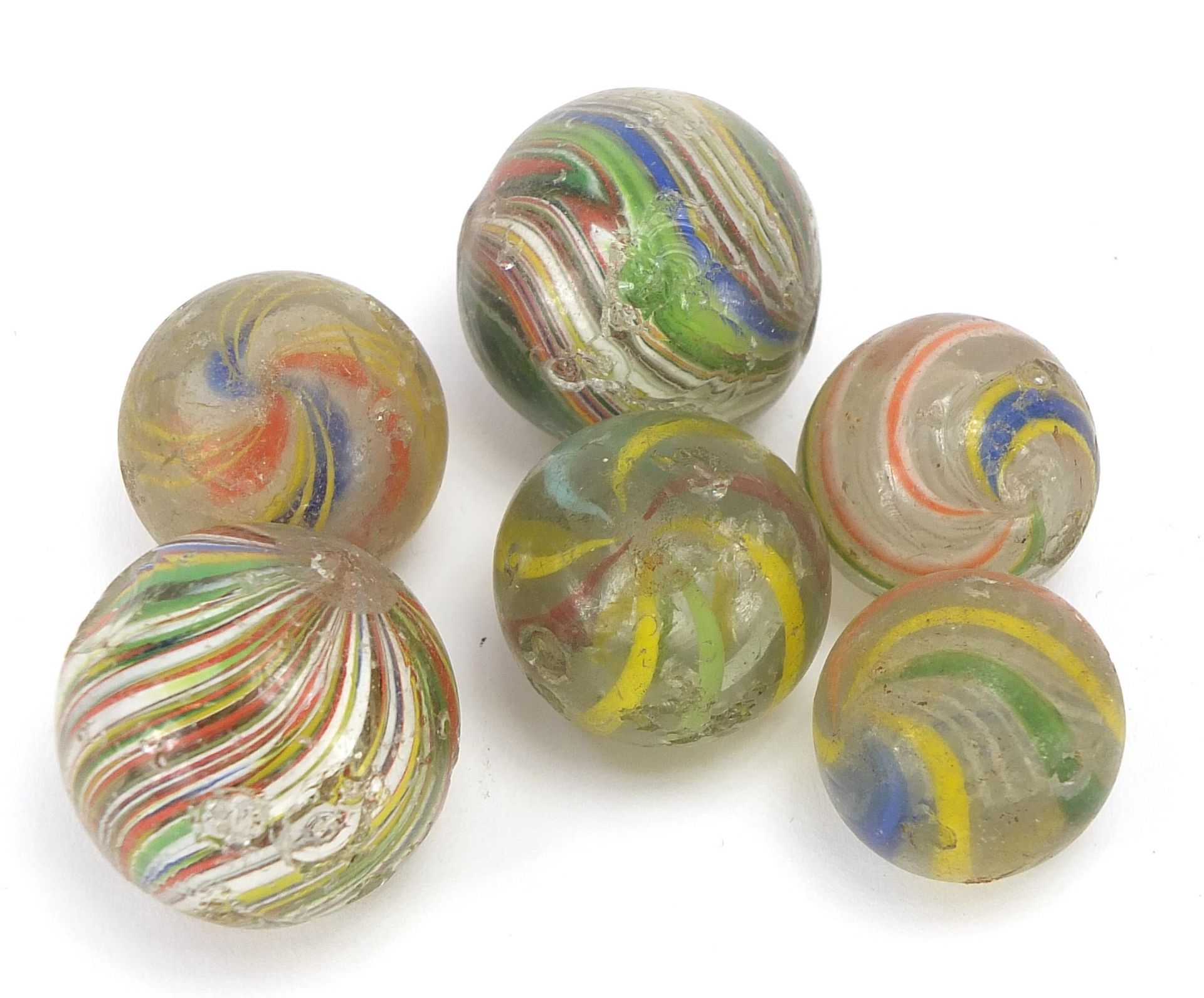 Six antique coloured swirl glass marbles, the largest approximately 3.5cm in diameter - Image 2 of 2