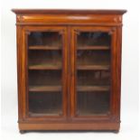 Mahogany bookcase fitted with a pair of glazed doors enclosing three adjustable shelves, 169cm H x