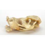 Japanese carved ivory okimono depicting monkeys, frogs and a snake, 8cm in length