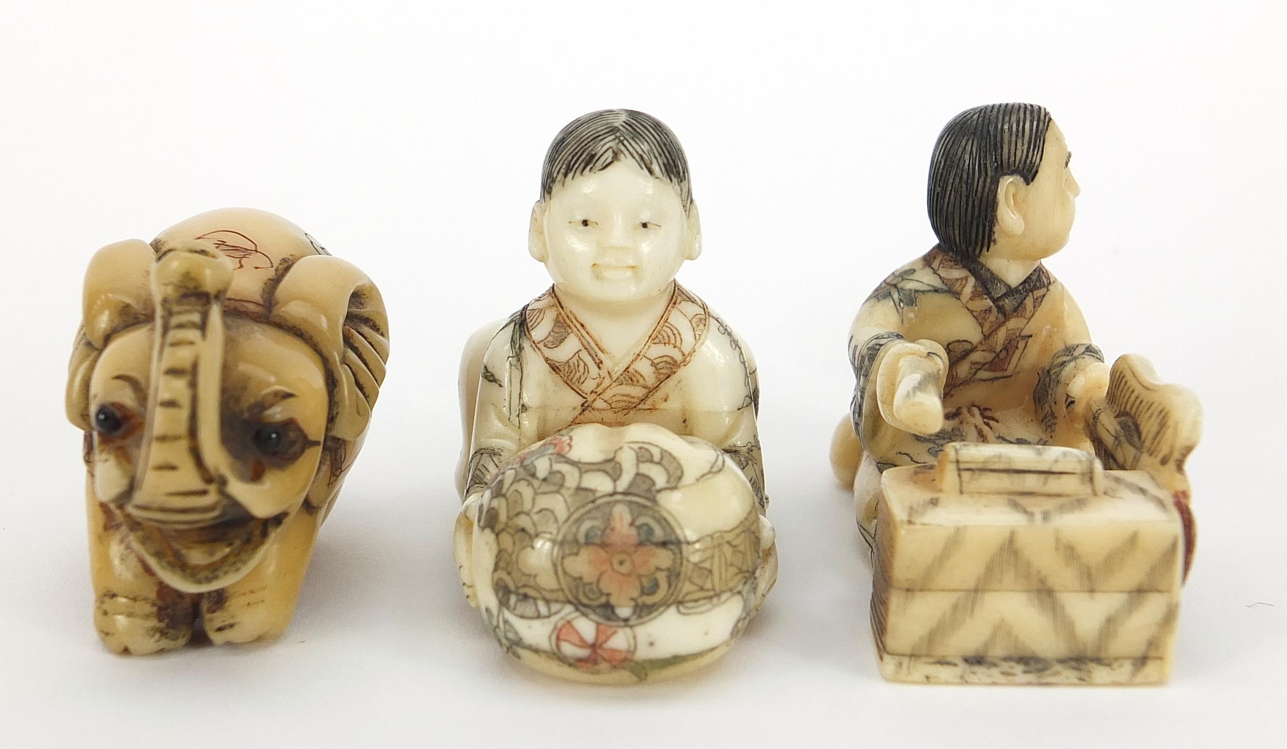 Three Japanese carved ivory netsukes including a elephant, character marks to the bases, the largest - Image 2 of 8