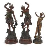 Three bronzed spelter figurines on bases, the largest 41cm high