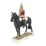 Goebel, West German military interest porcelain figure of a Life Guard on horseback, mounted on a