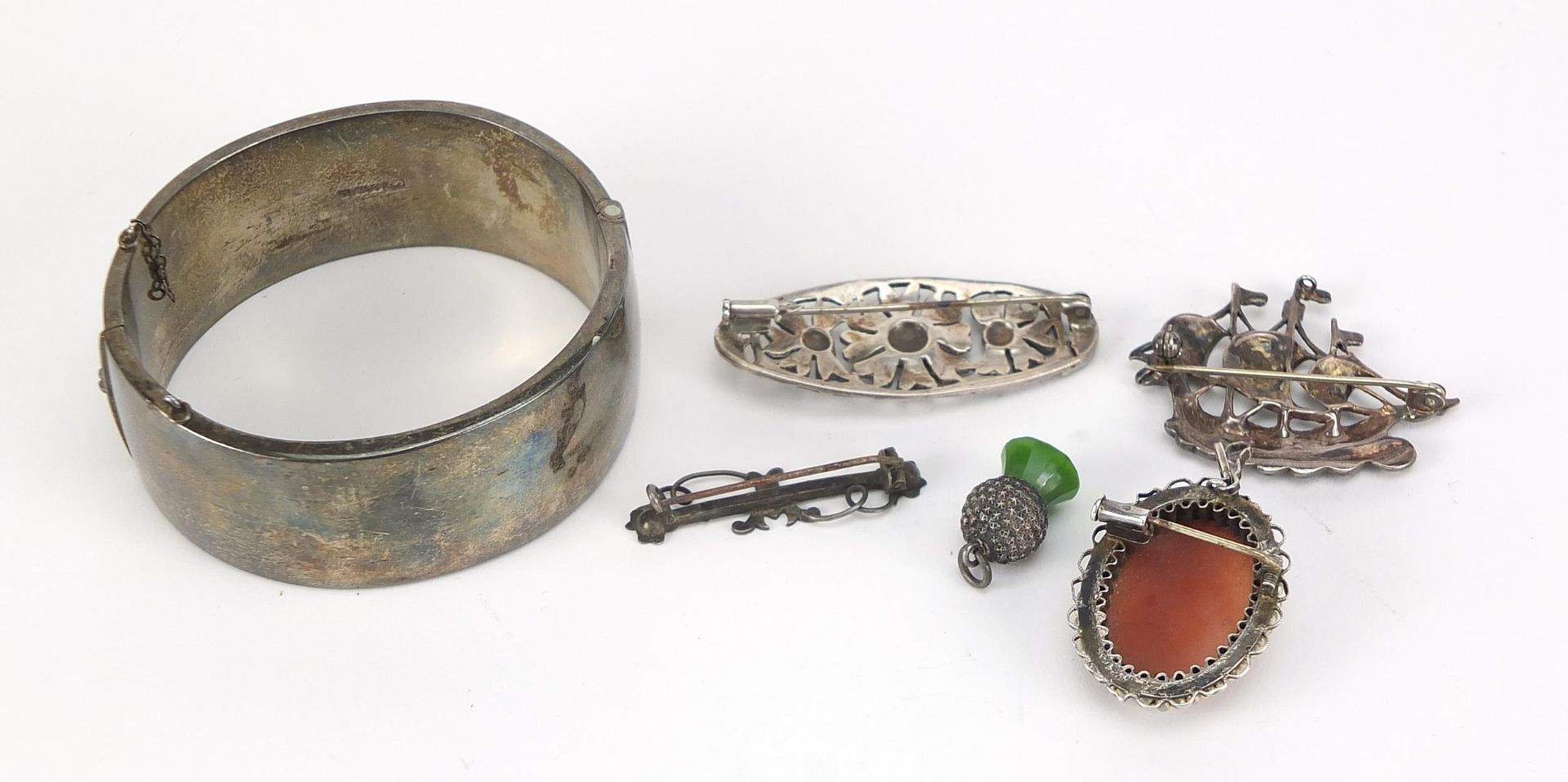 Silver jewellery including a large Victorian style hinged bangle and marcasite brooches, 71.5g - Image 2 of 3