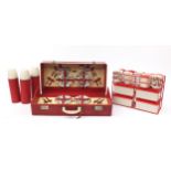 Large red Brexton picnic hamper retailed by Harrods of London, the hamper comprising Thermos flasks,