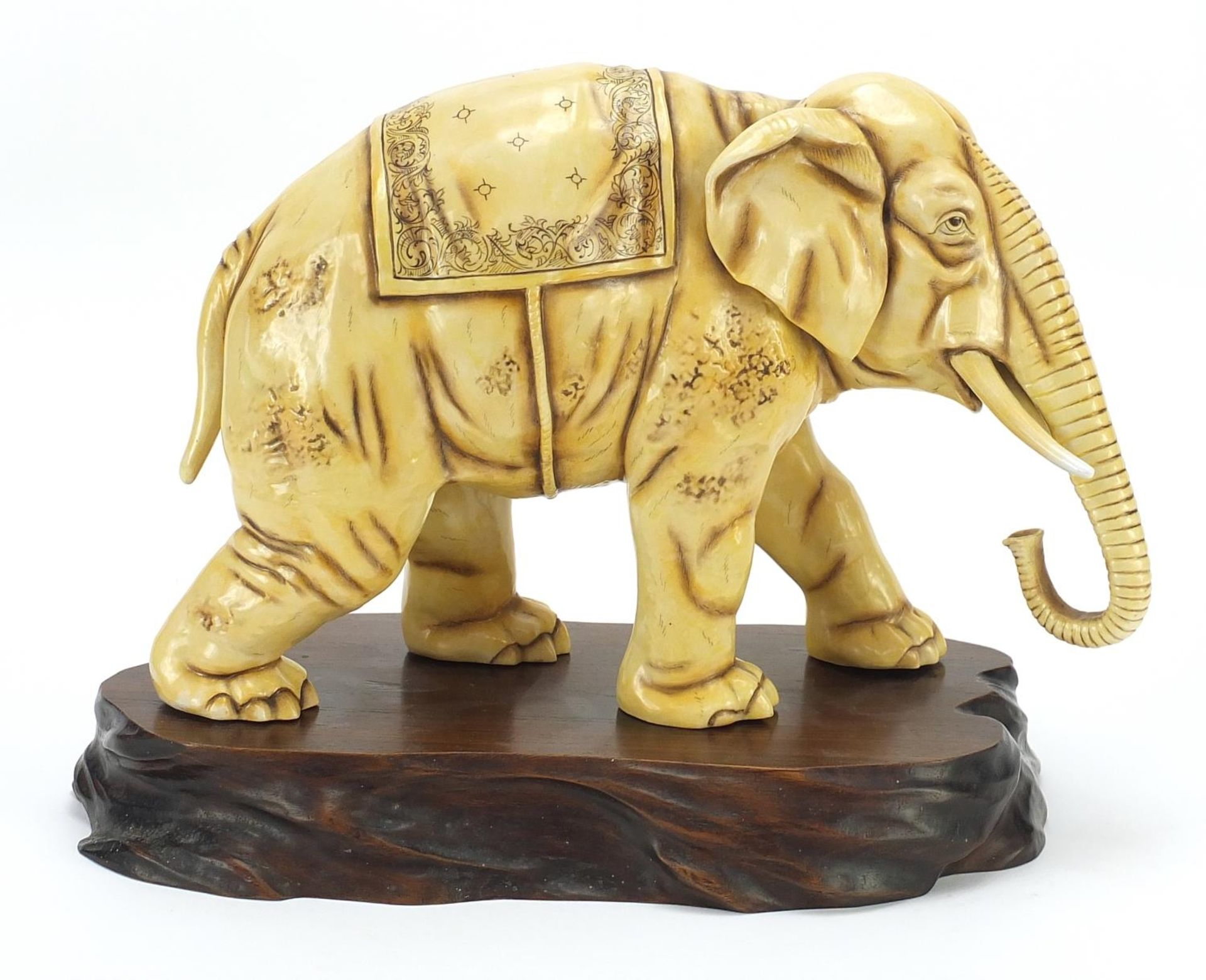 Ivory coloured porcelain model of an elephant on wooden stand, blue anchor mark under one foot, - Image 5 of 11