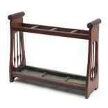 Arts & Crafts mahogany stick stand with drip tray, 73cm H x 94cm W x 30cm D