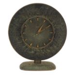 German partially gilt cast iron mantle clock cast in relief with a continuous band of nude dancing